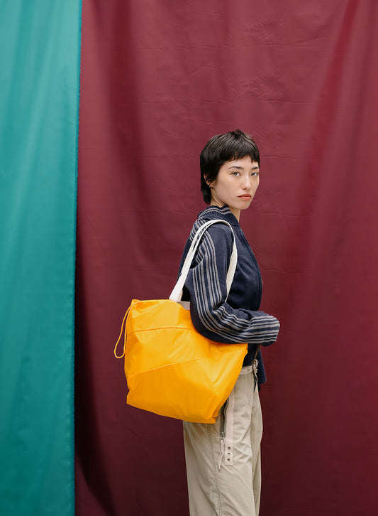 The New Trash Bag Mono Arise Medium