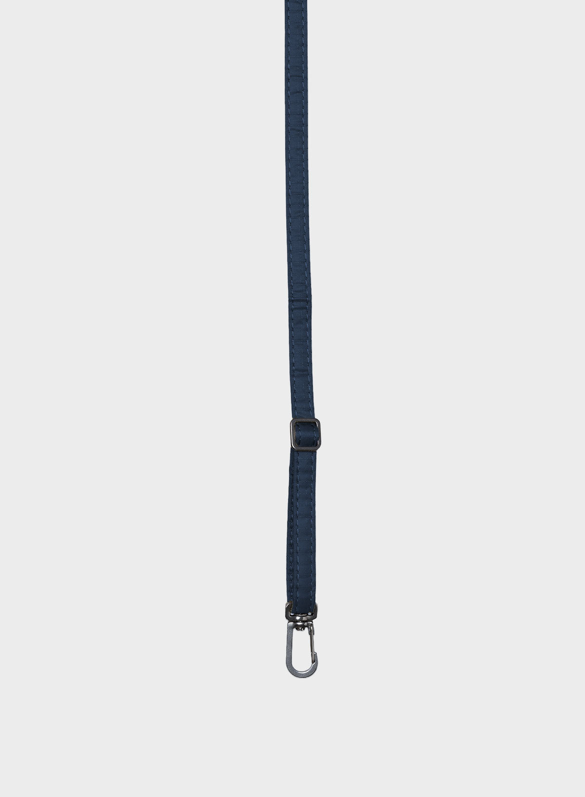 A dark navy blue strap with a silver metal carabiner clip at the bottom, shown vertically against a light gray background.