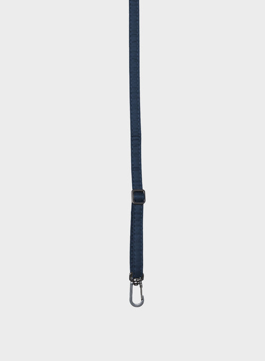 A dark navy blue strap with a silver metal carabiner clip at the bottom, shown vertically against a light gray background.